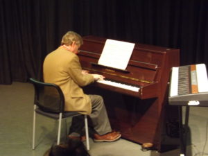 Professor Irving playing to the students